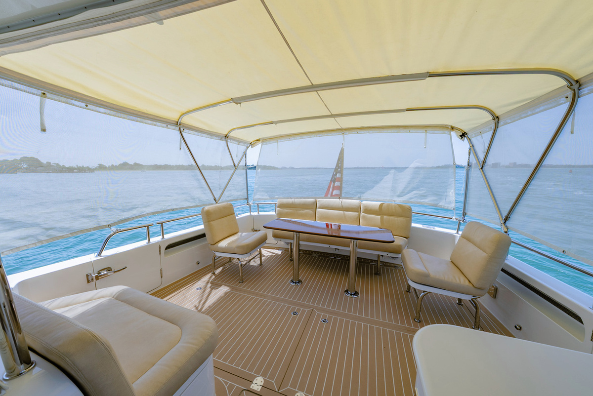 44-Aft-Seating-with-sunbrella-cutains-9250F.jpg