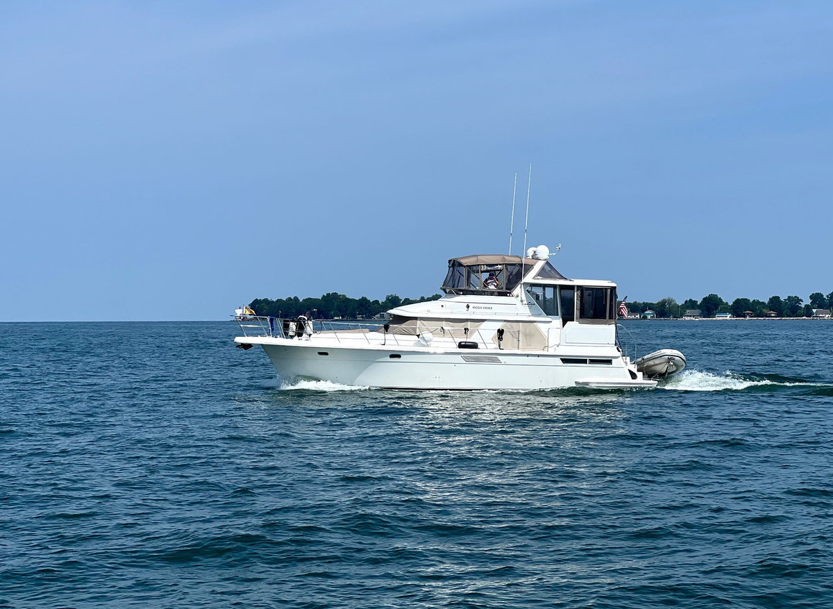 Image of ‘97 Spacious Carver 445 aft-cabin, twin Cummins 450 diesels, dinghy/15 hp Mercury, and many  extras.