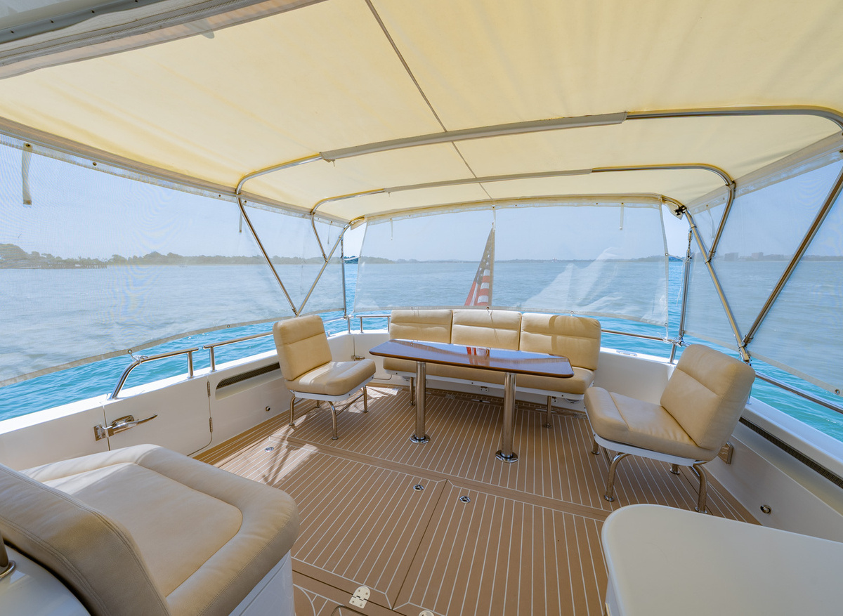 44-Aft-Seating-with-sunbrella-cutains-D3579.jpg