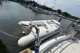 Image of Evinrude 25hp outboard motor and Mercury Dinghy