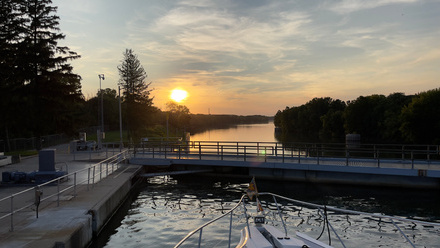 Burgee Flying on Boat Docked Overlooking Sunset at Marseilles Lock